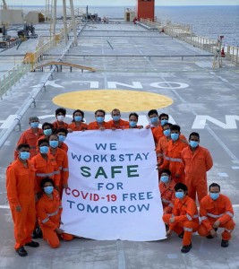 a-photo-of-seafarers-sharing-a-message-of-safety-m