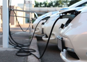 Charging modern electric cars from station outdoors