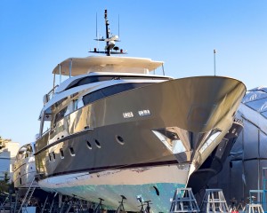 Luxury yacht on scaffolding's for maintenance at dry dock